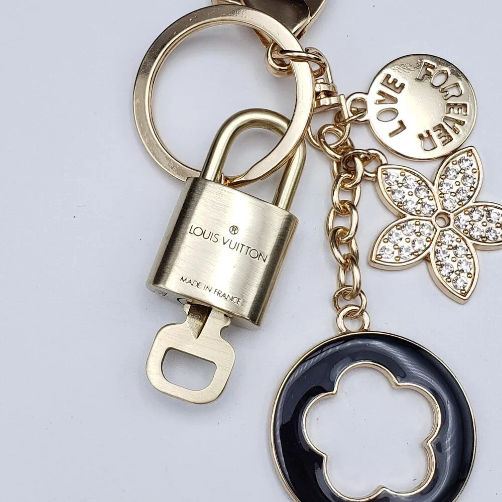 Authentic Louis Vuitton Lock & Key with Unbranded Flower Charm, Keychain